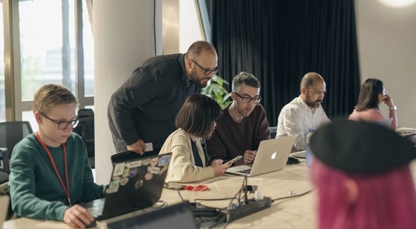 A group of TomTom'ers and OSM map editors